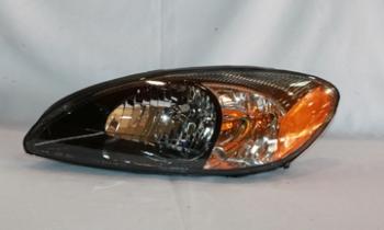 2003 Ford Taurus Headlight Assembly Left TYC 20582290 image 1 of 4